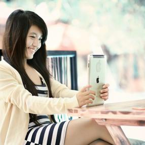 Woman holding ipad